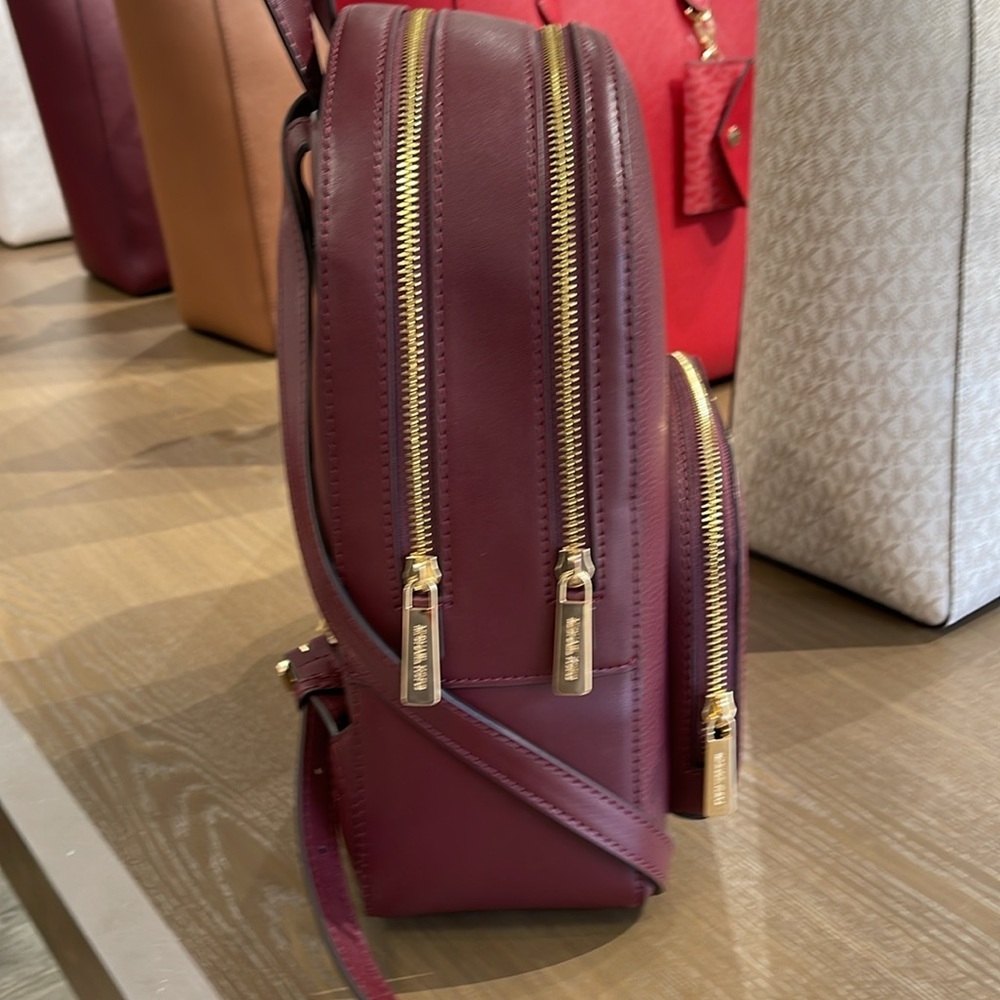 Michael Kors Jaycee Medium Pebbled Leather Backpack
Oxblood/Golden NWT - Picture 4 of 16